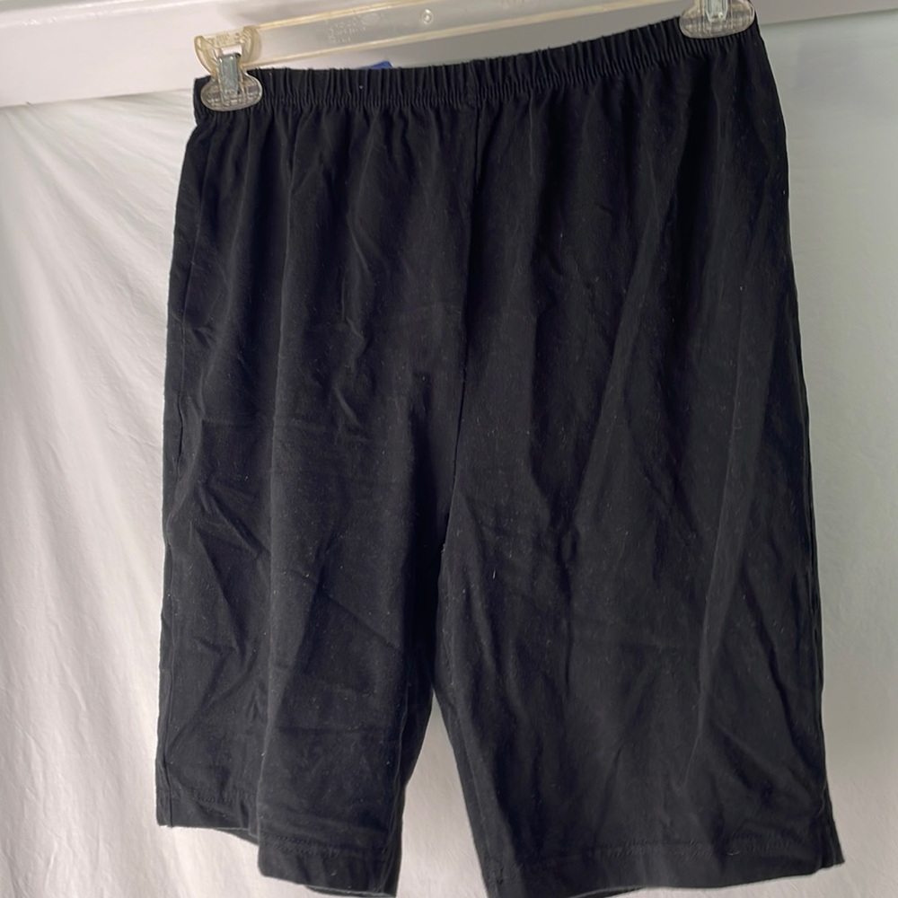 Woman within size large black bike shorts, 95% cotton 5% spandex